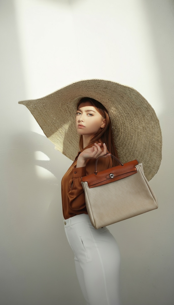 Editorial portrait with handbag